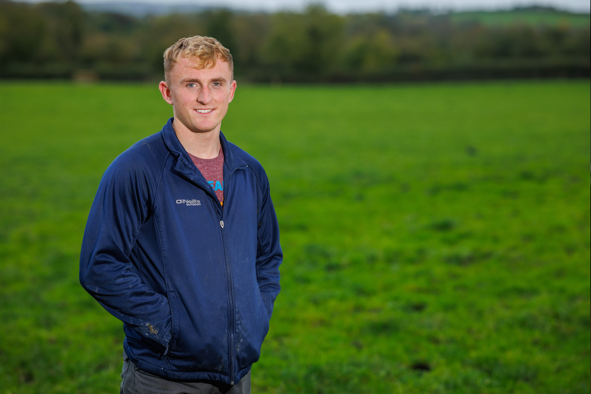 Farmer standing in shed